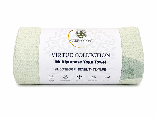 Rolled-up yoga towel with Coremotion label on a white background